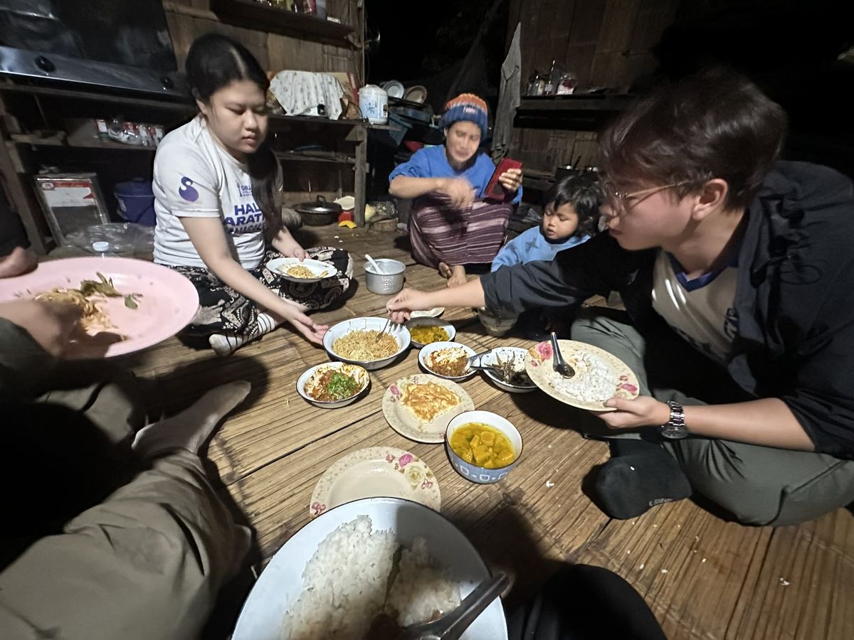 Shared meal during the community visit
